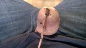Man jerks off holding worms up his dick for better stimulation